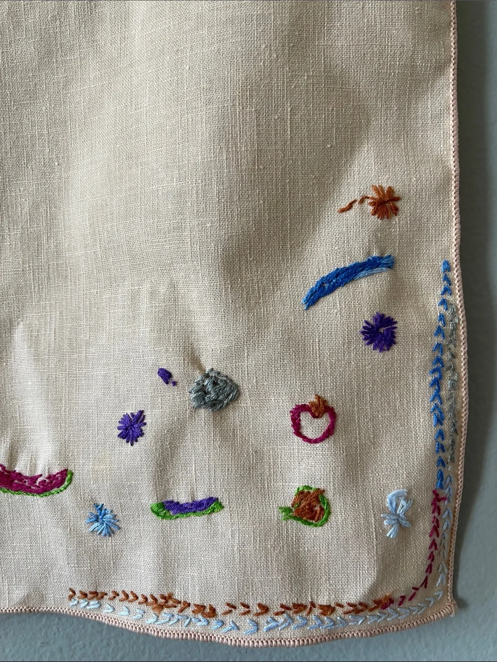 Hand-Embroidered Linen Napkin with Colorful Floral Accents